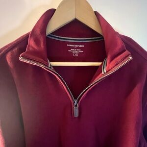 Burgundy half zip knit sweater with gray elbow patches